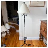 BLACK FLOOR LAMP | Scrolled frame on tripod base with leaf finial and cream fabric shade, turns on; 