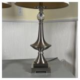 Contemporary table lamps with brushed metal and clear glass orbs, having white cylindrical shades; h