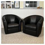 PAIR ITALSOFA CHAIRS | Black leather armchairs, barrel back, swiveling, in overall very good conditi