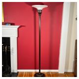 FLOOR LAMP | Bronzed column floor lamp with a white milk glass top and scroll openwork accents; h. 6