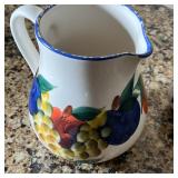 Tiffany Capri, a large Dansk ceramic pitcher painted with assorted fruits (8 in.), a medium ceramic 