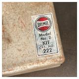 DREMEL TOOLS | Misc. tools and parts in a metal Dremel kit box