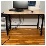 TUBULAR FRAME DESK | With a wood laminate top; h. 30 x w. 48 x d. 27 in. [some wear to top surface]