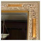 carved wall mirror with floral scrollwork carved accents and beveled glass; 52 x 42 in.