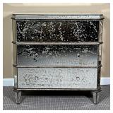 side table / nightstand accented with subtle horizontal lines between each drawer over tapering legs