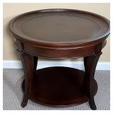 Hooker Furniture round side table / lamp stand with cherry finish and lower shelf; h. 24 x 24 x 27-1