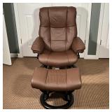 Norway Stressless Consul Chair with ottoman, reclining chair with chocolate leather upholstery on a 