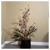 FAUX ORCHIDS | Faux purple orchids in a black round planter; overall h. 43 in.