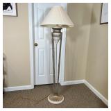 ITALIANATE FLOOR LAMP | Small urn resting on four long torch-form rods joined on a gilt scalloped ba