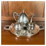 (4pc) SILVER PLATED TEA SET | A silver on copper tea set, including a teapot, covered sugar, and ope