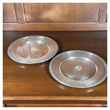 (2pc) STERLING SILVER PLATES | A pair of sterling silver round dishes with engraved central monogram