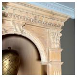 shelves over cabinet doors each with an interior shelf, with overall reeded  columns and carved acan