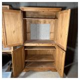 entertainment center / TV cabinet, top and bottom sections with double cabinet doors, the top sectio