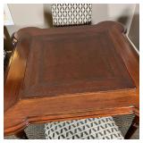 Dark wood finish with leather playing surface, includes set of 4 Sam Moore dining chairs with fabric