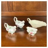 (4pc) CHINA TABLE ITEMS | All bone china with gilt accents; largest by Lenox (l. 8 in.); plus three 