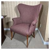 WINGBACK ARM CHAIR | Fabric upholstery with carved wood sabre legs; h. 40 x 33 x 32 in.