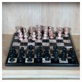MARBLE STONE CHESS SET | Pink and black marble chess set; 13-1/2 in.