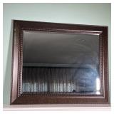 BEVELED GLASS MIRROR | Wall mirror with dark a brown metal frame; overall h. 28-1/4 x 34 in.
