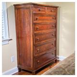 tall dresser having two drawers over six full-width drawers, appearing in overall good condition wit