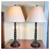 PAIR TWISTED COLUMN LAMPS | Faux wood composition table lamps; overall h. 29 in.