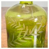 (2pc) GREEN GLASS BOTTLES | Molded green glass, including one with cut viney decorations; largest 6 
