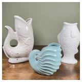(3pc) NAUTICAL CERAMICS | Including two white fish-form vases, one designed as a pitcher (tallest 13