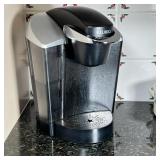 KEURIG COFFEE MAKER | Functioning! And appearing in good condition.