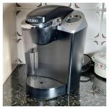 KEURIG COFFEE MAKER | Functioning! And appearing in good condition.