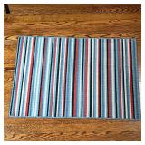 STRIPED FLOOR MAT | Small woven rug with colorful stripes; 36 x 24 in.