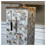 Iridescent mother of pearl mosaic column on a chrome / stainless square base, with a custom rectangu
