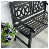 Outdoor bench, wood with black paint, patterned openwork back rest with slatted seat and scrolled ar