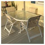 OUTDOOR DINING SUITE | Telescope Casual patio dining set, including a glass top table of oval shape 