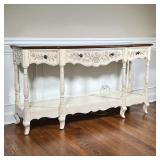 CENTURY CONSOLE TABLE | Sideboard / hall table, having a whitewash / light wood finish with carved f