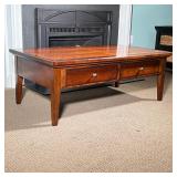 BASSETT COFFEE TABLE | By Bassett Furniture, a rectangular low table / cocktail table having a dark 