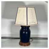 POTTERY TABLE LAMP | Ribbed blue pottery jar on a wood stand and mounted as a lamp with a unique sai