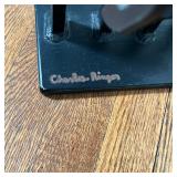 kinetic sculpture, silhouette of a cowboy and four horses, signed on the base and dated 1990; h. 13-