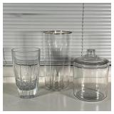 (3pc) GLASS DÉCOR | Including a tall quatrefoil vase with gilt rim (h. 13 in.), a blown glass lidded