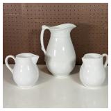 (3pc) MADDOCK & OTHER PITCHERS | Including a Maddock & Co. white ironware pitcher of large size and 