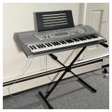 CASIO ELECTRIC KEYBOARD | Piano Keyboard with learning features- tested and works! On a folding stan