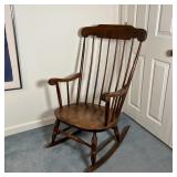 WOODEN ROCKING CHAIR | Solid wood spindle back rocking chair with scrolled arms; h. 40 x w. 24-3/4 x