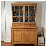 PINE HUTCH CABINET | In two sections, with two glass doors before three shelves over two drawers, th
