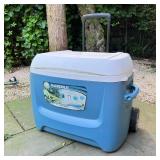 IGLOO MAXCOLD COOLER | With wheels and extending carrying handle; h. 20-1/2 x 26 x 15 in.
