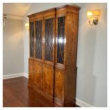 China hutch with four glazed diamond panel doors over four burled veneer cabinet doors, with inset g