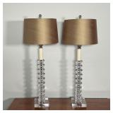 PAIR FANCY TABLE LAMPS | Heavy glass or rock crystal column table lamps with gold fabric shades; ove