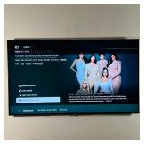 SONY 64 IN. TV | Large flat screen TV, wall mounted, with stands to sit on a flat surface (not pictu