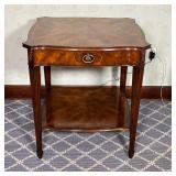 Theodore Alexander, with a single drawer and a lower shelf, on fluted tapering legs; h. 27 x w. 24-3