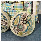 pillow case, two sham pillows, two round throw pillows, and a quilt, all with fun flowery and paisle