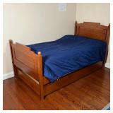 OAK TWIN TRUNDLE BED | Nicely figured wood twin bed frame with a pullout trundle for extra sleeping 