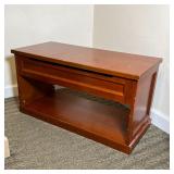 WOOD HALL BENCH | Small hall bench with lift top storage and lower shelf, of dark wood; h. 19 x w. 3