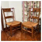 PAIR RUSH SIDE CHAIRS | Wood back rests with openwork star motifs and rush seats; h. 39 x w. 21 x d.